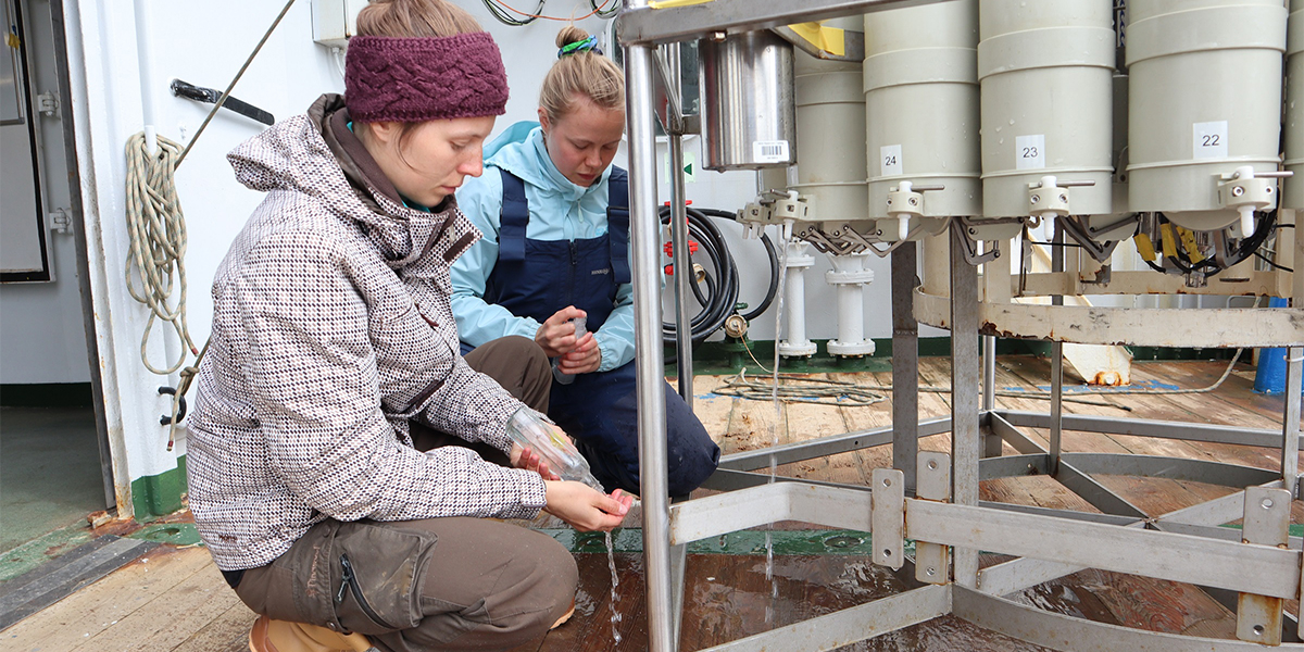 Photo: Fleur and Nora taking salinity samples. Credit: Niek Kusters